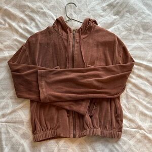 Brown cropped jacket. Feels like velvet/has pockets + hoodie. Flared sleeves